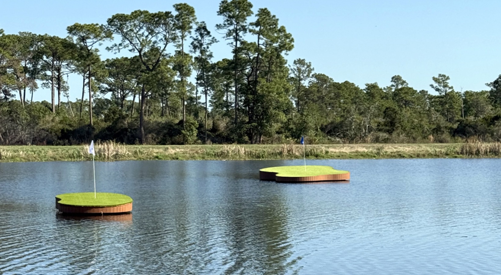 Lakeside golf experience overlooking scenic water views at Integra Avalon